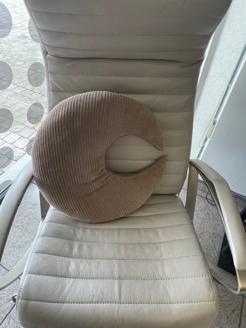 Maanvormig kussen